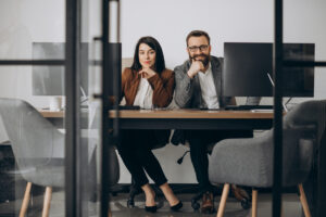 Two business partners working together in office